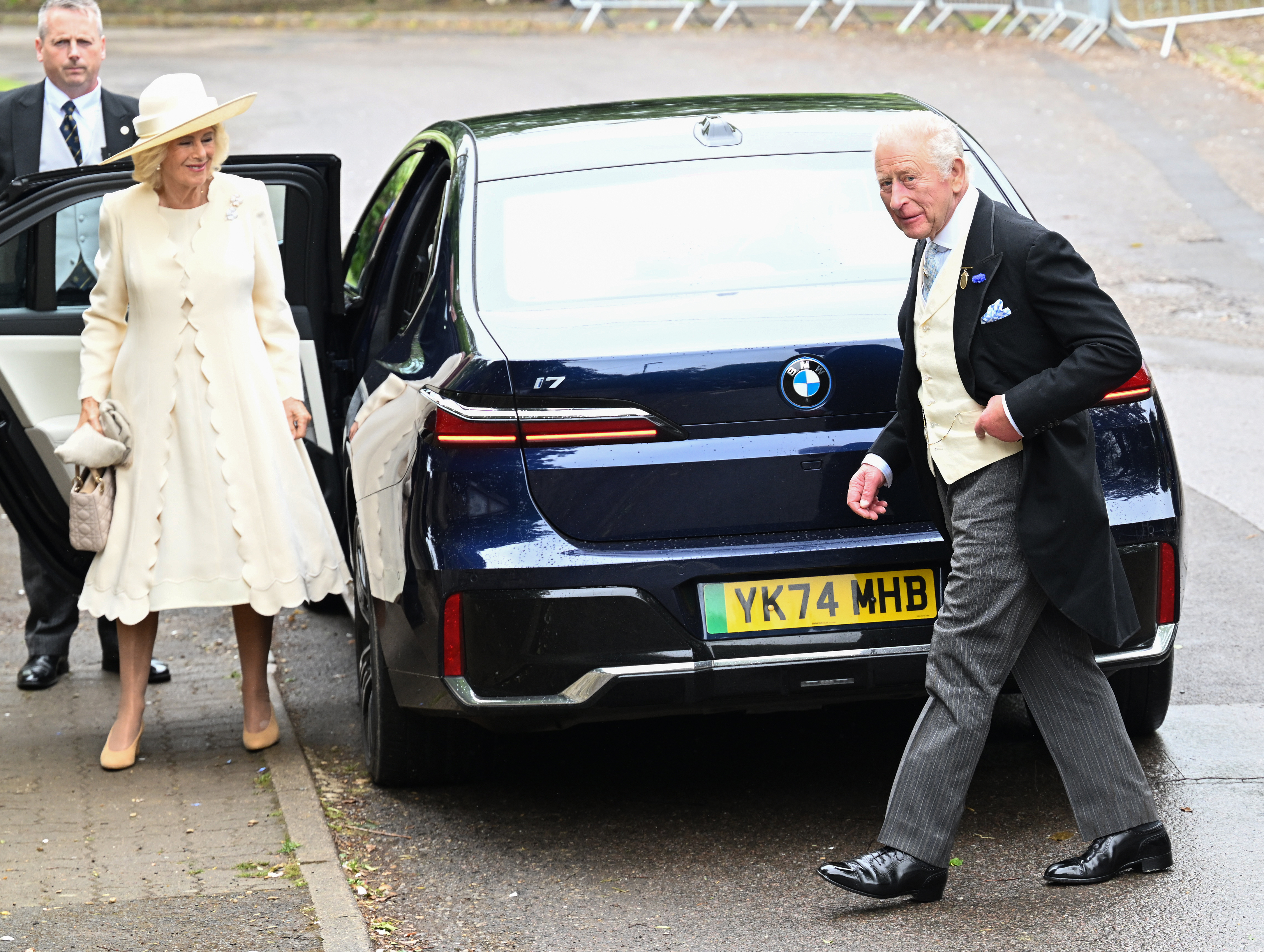 King Charles and Queen Camilla arriving at Harriet Sperling's wedding to Peter Phillips