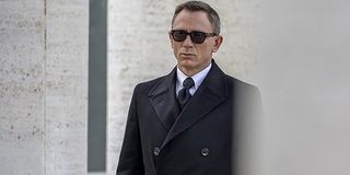 Daniel Craig wearing sunglasses as James Bond
