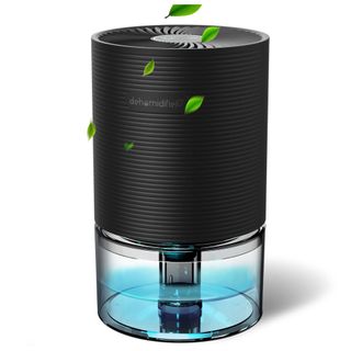 Black KLOUDIC dehumidifier with water and green leaves