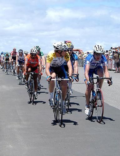 The peloton spreads out along the Esplanade at Snapper Point, Aldinga