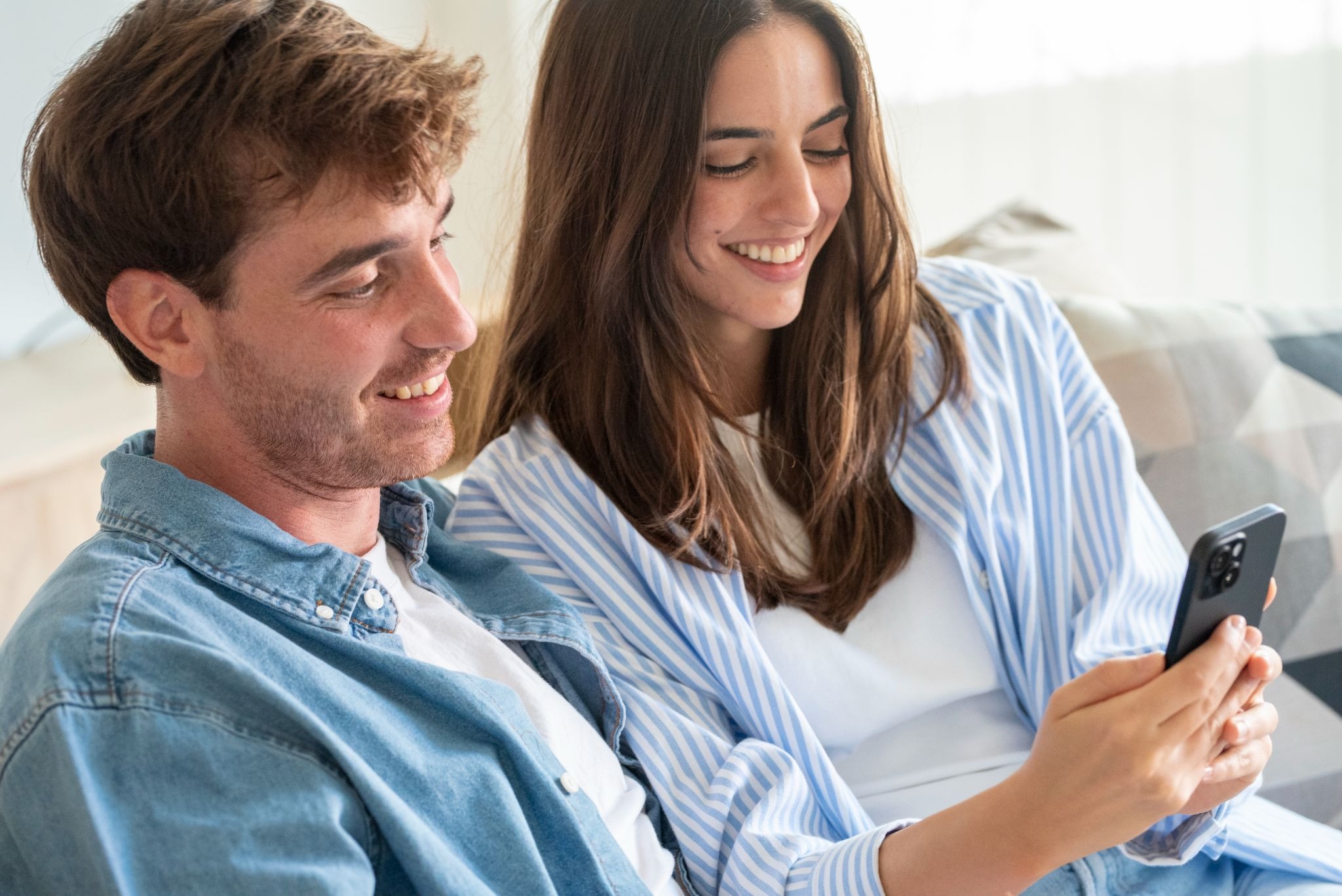 Couple looking at a phone