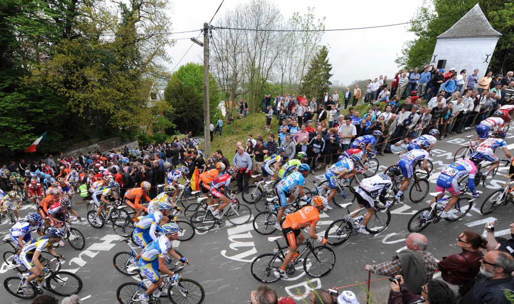 The pack competes during the uphill ride of Huy on April 22 2009 during the Fleche Wallonne mens cycling race between Charleroi and Huy AFP PHOTOJOHN THYS Photo credit should read JOHN THYSAFP via Getty Images