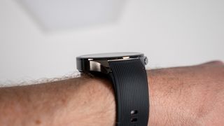 The side of the OnePlus Watch 3 while wearing it