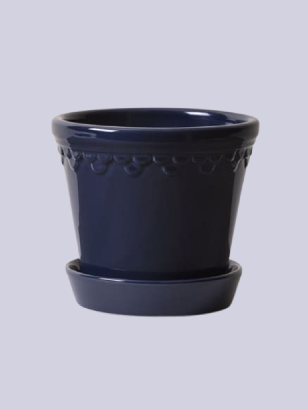 A glossy blue planter and saucer from Bergs Potter