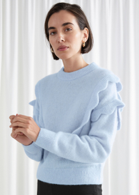 &amp; Other Stories Alpaca Blend Scallop Knit Sweater
£85
We're in love with this super soft powder blue knit, which is perfect for keeping cosy during the winter months. 