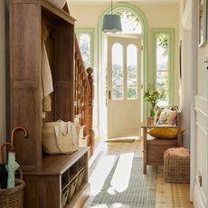 Bright hallway with blue runner rug