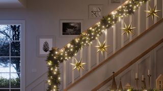Nanoleaf smart holiday string lights around a banister