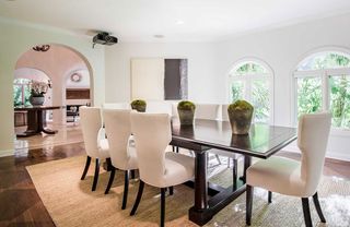white dining room with table and chairs