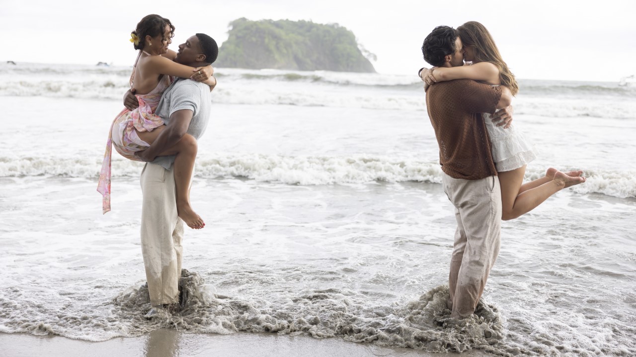 Andrew Spencer holds Alexe Godin and Spencer Conley lifts Jess Edwards as they stand in the ocean on the Bachelor in Paradise Season 10 finale.