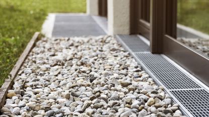 Drainage with gravel outside of property