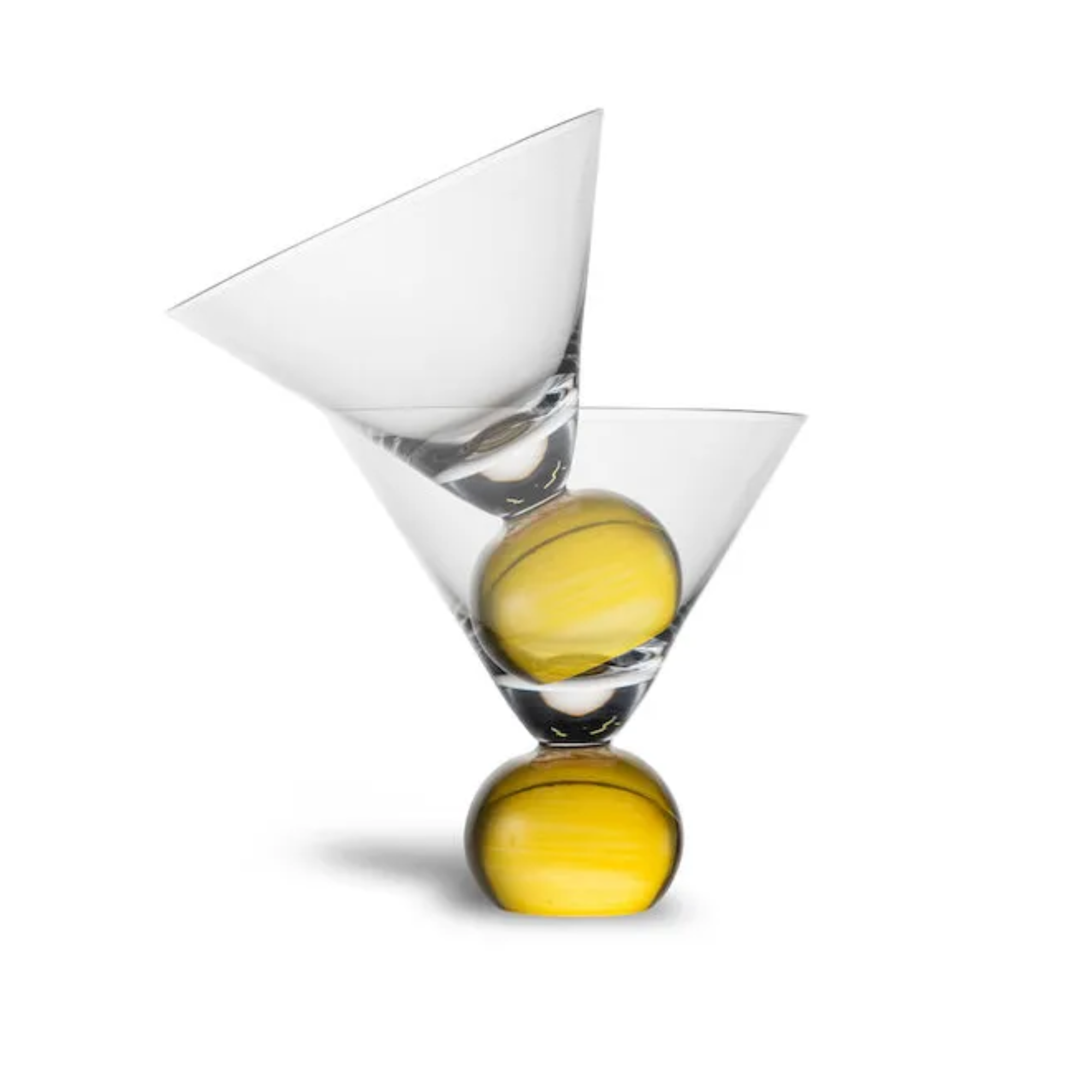 a set of two cocktail glasses with a yellow circular base