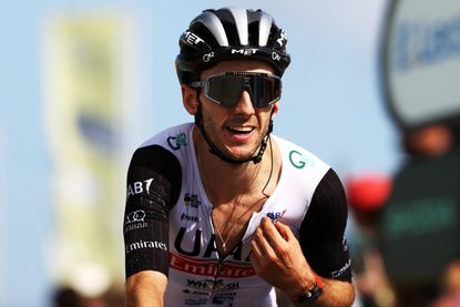 Adam Yates crosses the line on stage 20 of 2023 Tour de France