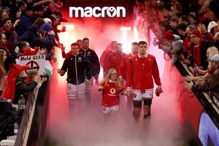 Dafydd Jenkins leads out Wales against Italy in 2024.