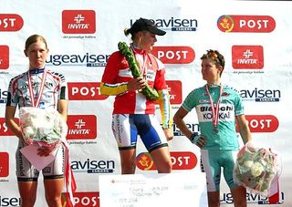 Bekker stands on the left spot on the podium