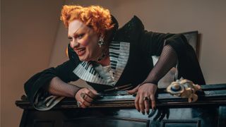 Maestro (Jinkx Monsoon) climbing out of a piano in Doctor Who season 14 episode 2