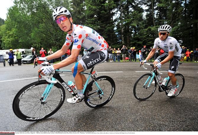 Tony Martin (Omega Pharma-QuickStep) leads the breakaway charge wearing the mountains jersey
