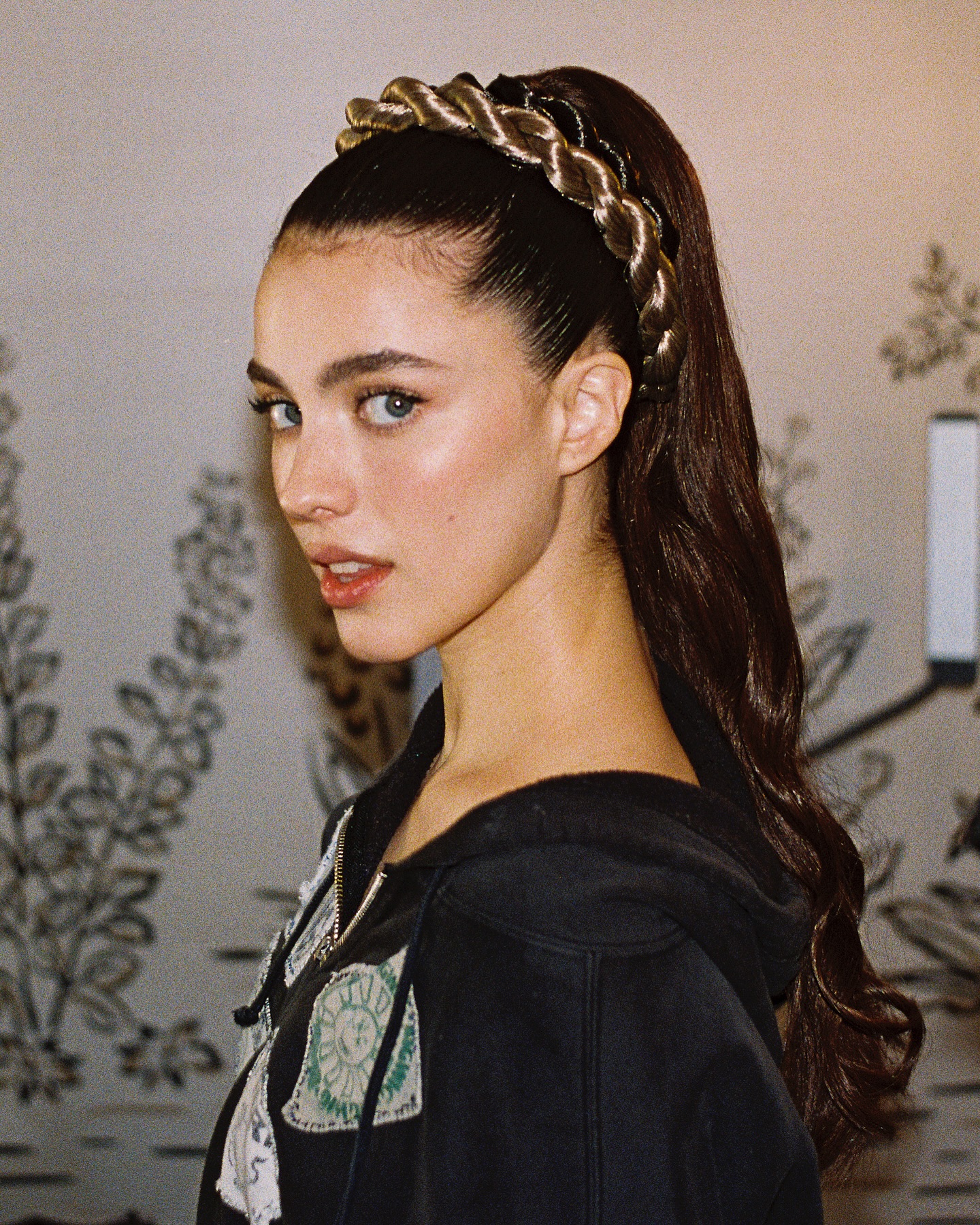 Margaret Qualley with halo braid twisted hairstyle