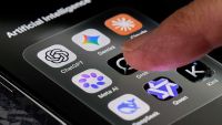Phone user choosing which AI to open.