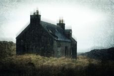 scary looking house on a hill