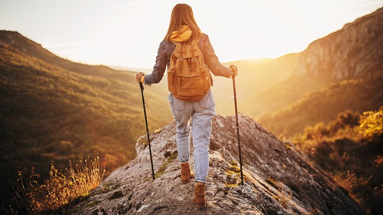 woman in hiking boots on a mountain