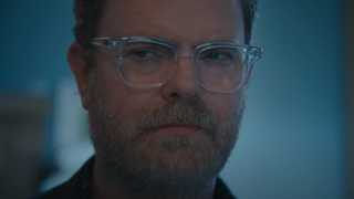 Rainn Wilson looking to the side in AT&T ad 2024