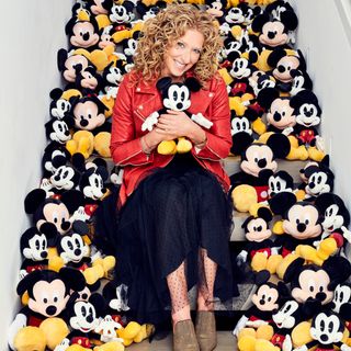 curly hair lady with so many mickey mouse