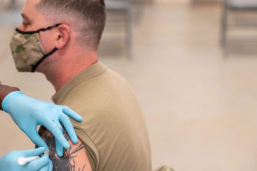  A soldier receives a COVID-19 vaccine from Army Preventative Medical Services in Fort Knox, Kentucky.