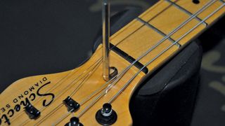 How to adjust an electric guitar's truss rod