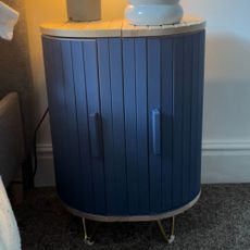 IKEA hack making a magasin bread bin into a bedside table with blue paint and gold legs