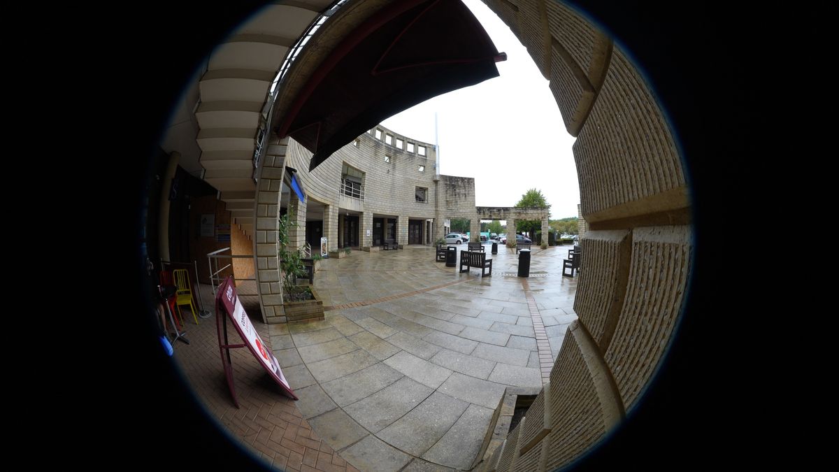 Distorted fisheye view of a forecourt of a cafe