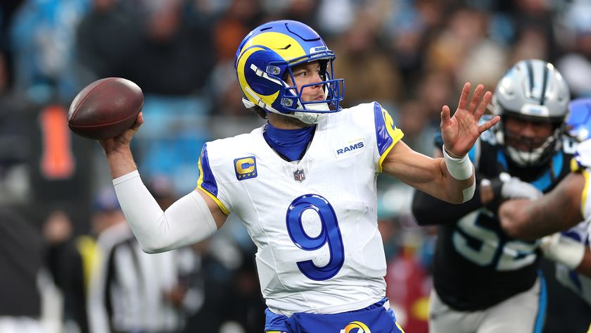 Matthew Stafford of the Los Angeles Rams passes the ball against the Carolina Panthers during and NFL game.