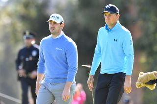 Patrick Cantlay and Jordan Spieth look on during the first round of the Genesis Invitational on February 15, 2024, at Riviera Country Club.