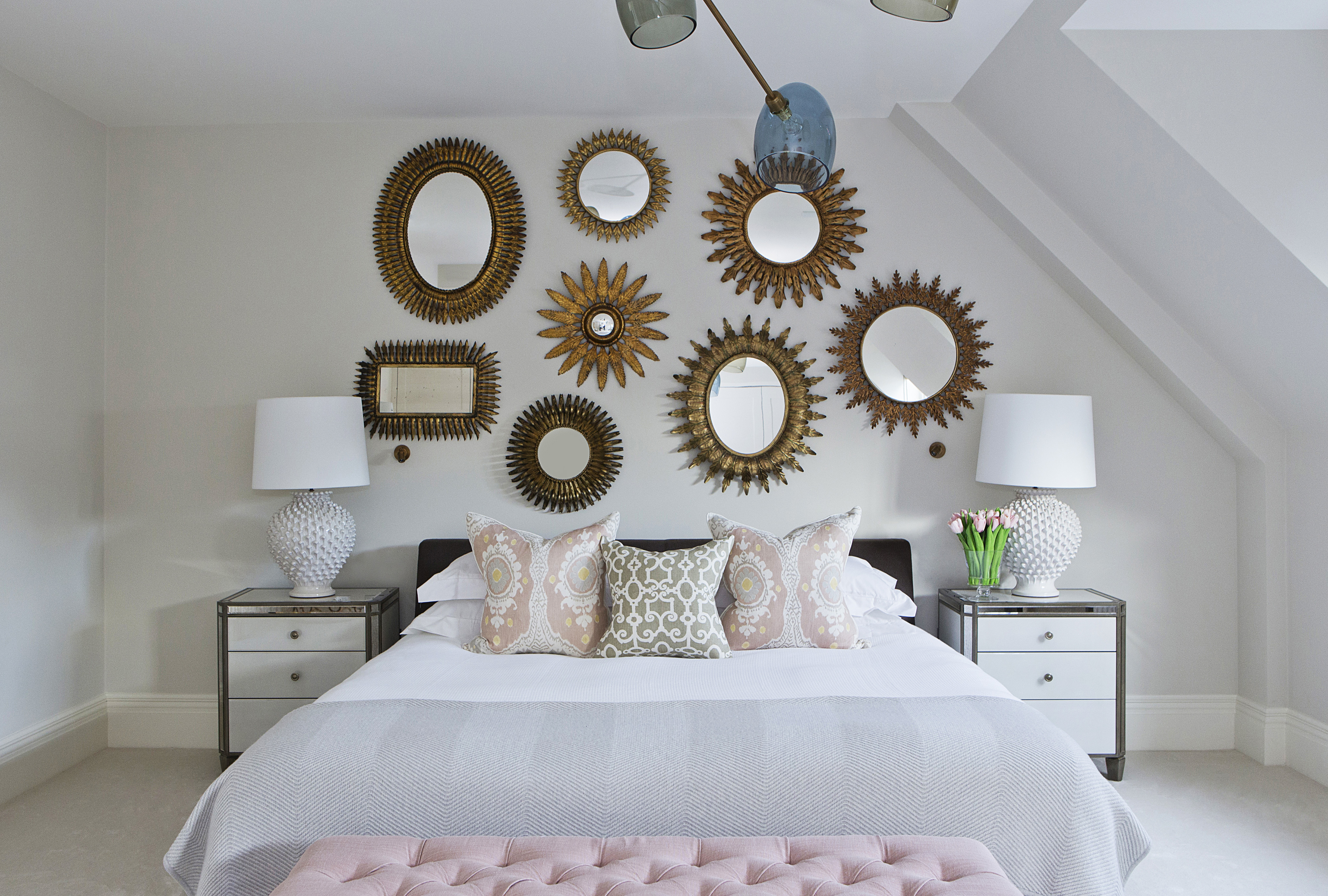 Bedroom with gallery wall of mirrors