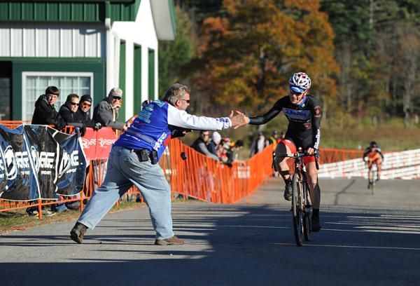 Justin Lindine (bikereg.com/Joe&rsquo;s Garage/Scott) gets congratulations from Alan Atwood on his second place.