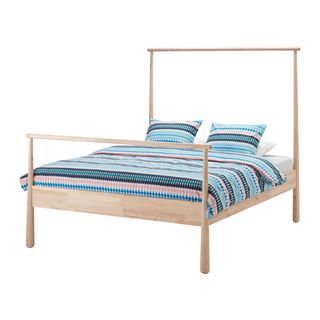 Gjora solid wood four-poster bed frame with blue linen