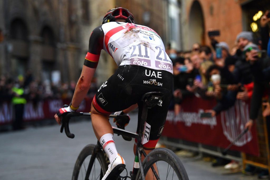 SIENA ITALY MARCH 05 Tadej Pogacar of Slovenia and UAE Team Emirates competes in the breakaway during the Eroica 16th Strade Bianche 2022 Mens Elite a 184km one day race from Siena to Siena Piazza del Campo 321m StradeBianche WorldTour on March 05 2022 in Siena Italy Photo by Luc ClaessenGetty Images