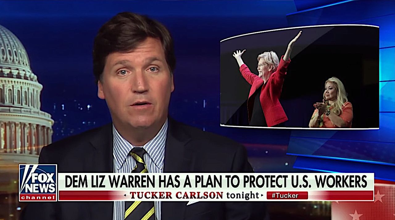 Tucker Carlson praises Elizabeth Warren