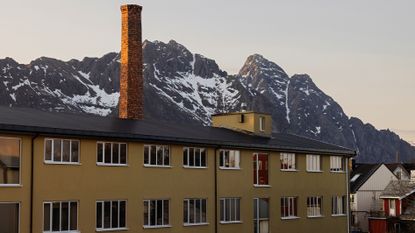Mountain backdrop and exterior of Trevarefabrikken hotel Norway, redesigned by jonathan tuckey design