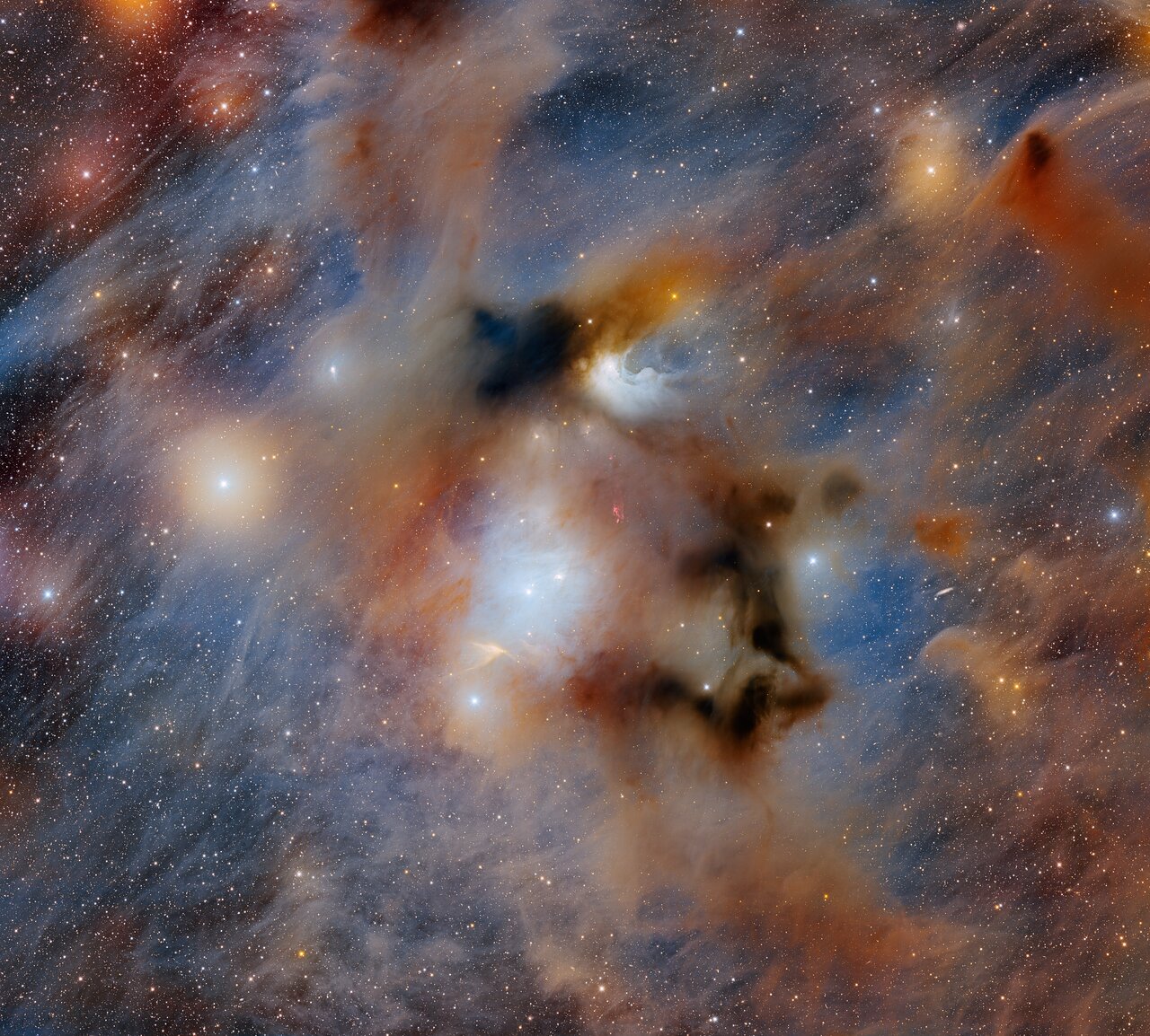 Wisps of red, black and blue smoke puntuated by golden and silver glowing orbs