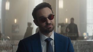 Charlie Cox's Matt Murdock sitting inside of a bank