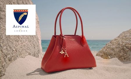Aspinal of London's red handbag
