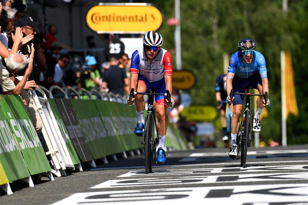 FOIX FRANCE JULY 19 LR Valentin Madouas of France and Team Groupama FDJ and Michael Woods of Canada and Team Israel Premier Tech cross the finish line during the 109th Tour de France 2022 Stage 16 a 1785km stage from Carcassonne to Foix TDF2022 WorldTour on July 19 2022 in Foix France Photo by Tim de WaeleGetty Images