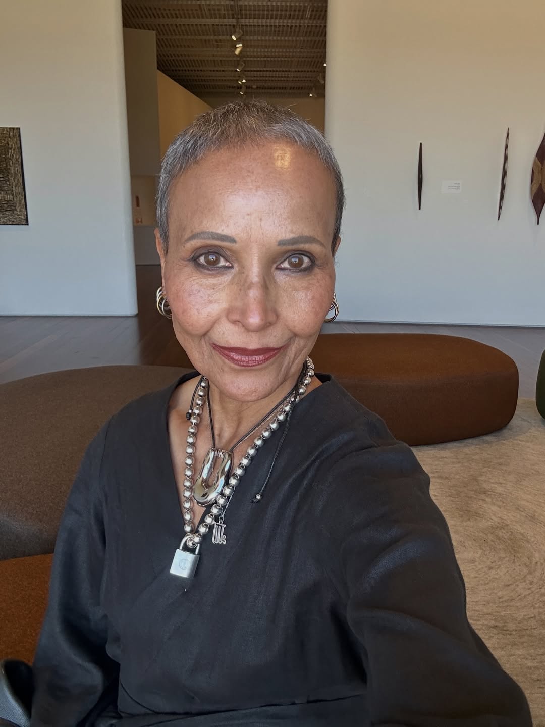 Yasmin wearing statement jewellery