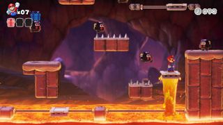 Un niveau de la montagne de feu dans Mario vs. Donkey Kong.