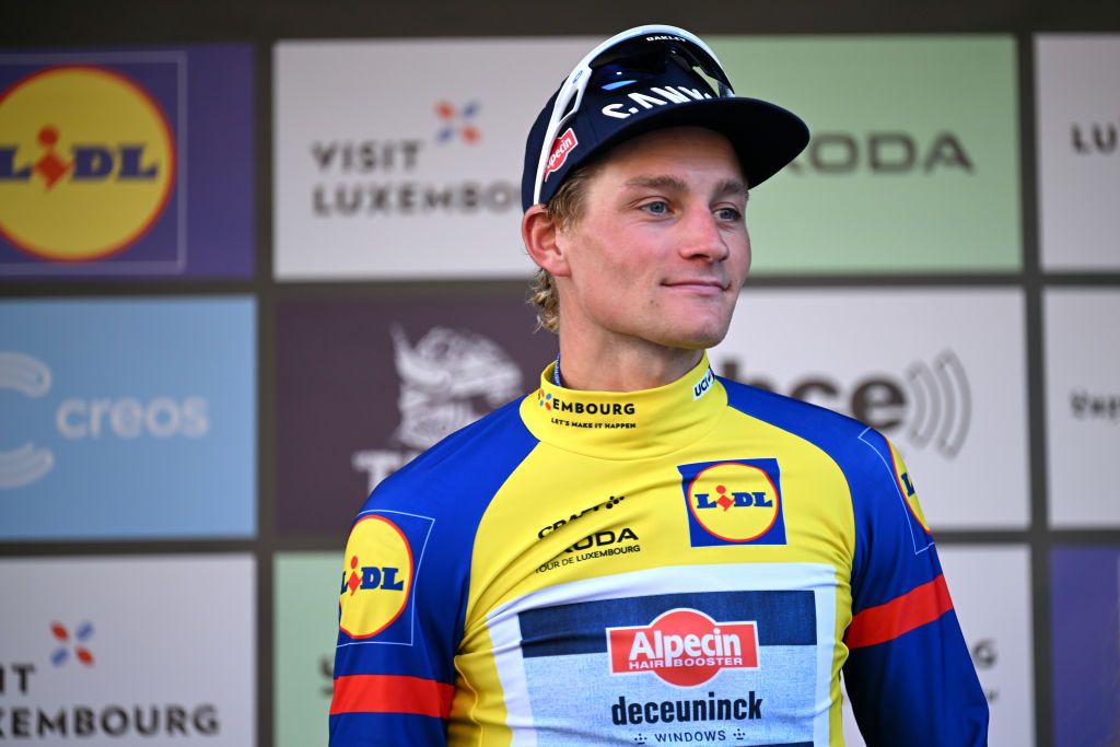 DIFFERDANGE LUXEMBOURG SEPTEMBER 21 Mathieu Van Der Poel of The Netherlands and Team AlpecinDeceuninck celebrates at podium as Yellow Leader Jersey winner during the 84th Tour de Luxembourg 2024 Stage 4 a 155km individual time trial stage from Differdange to Differdange UCIWT on September 21 2024 in Differdange Luxembourg Photo by Tim de WaeleGetty Images