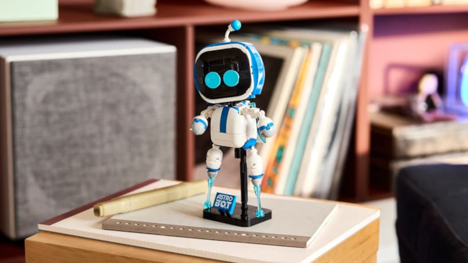 The Lego Astro Bot set sitting on a table