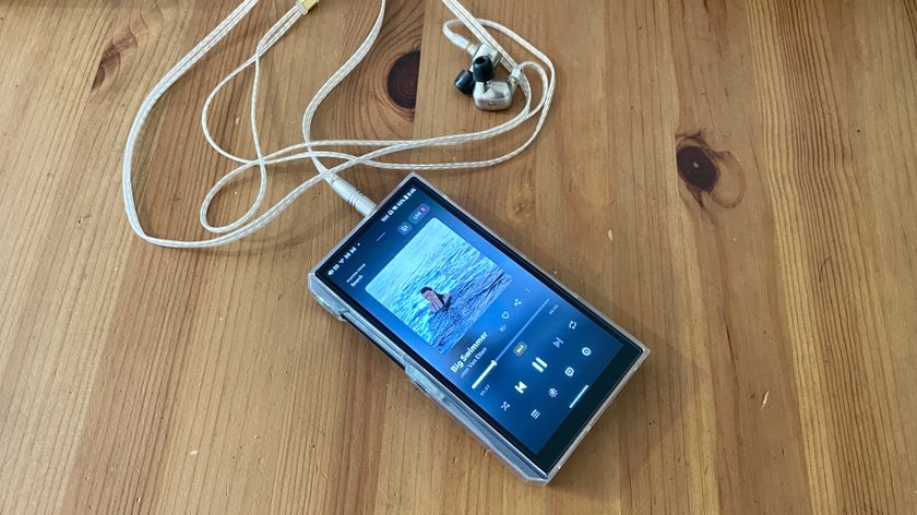 FiiO M23 on a wooden table