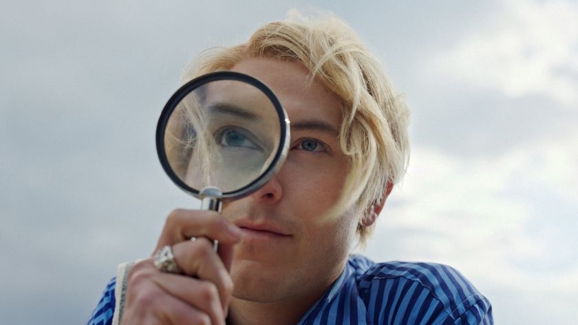 Taz Skylar's Sanji looking through magnifying glass in One Piece Season 2