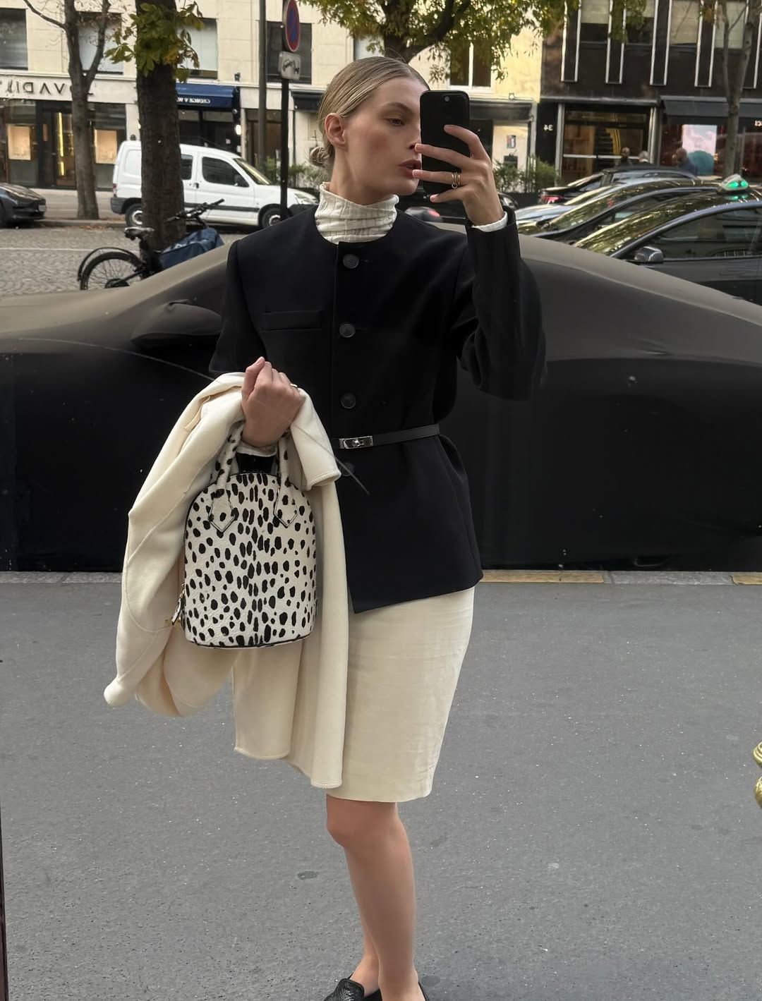 Influencer Christie Tyler wearing a knee-length skirt