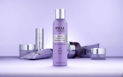 bottle of prai radiance tonic on purple background